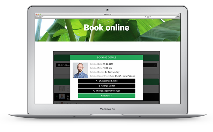 Doctor availability is displayed in the online booking system for a patient to select and book an appointment on laptop device